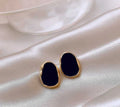 Minimalist Black Oval Gold Trim Stud Earrings