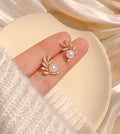 Gold Leaf Pearl Stud Earrings with Crystal Accents