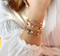 Layered Gold Bangle Stack Set